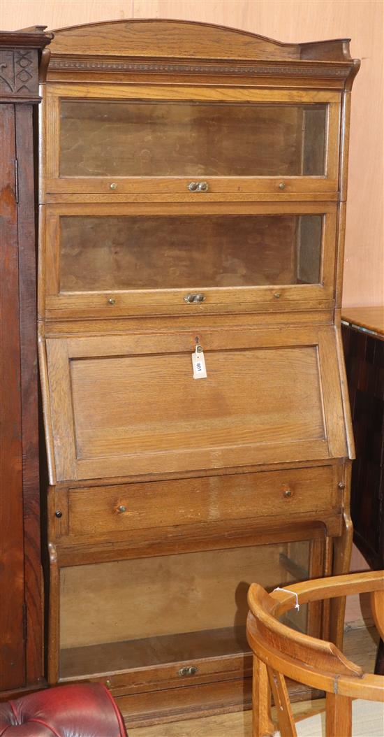 A Globe Wernicke style oak bureau bookcase W.88cm